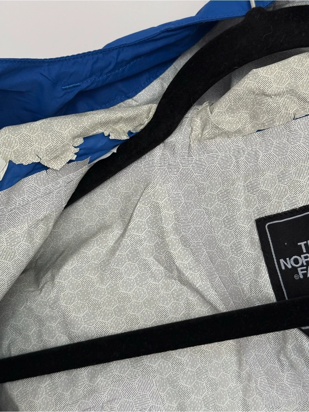 The North Face men’s blue raincoat/shell
